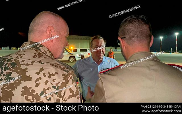 19 December 2023, Niger, Niamey: Boris Pistorius (M), Defense Minister of Germany, arrives at the airport in Niamey. Four and a half months after the military...