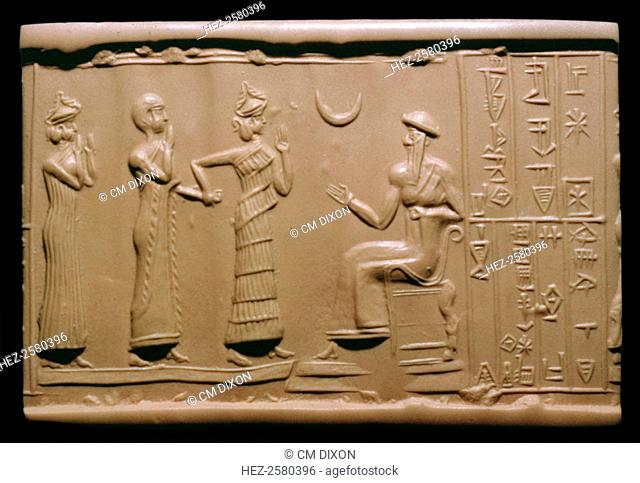Sumerian cylinder-seal impression depicting Haskhamer, Governor of the city of Ishkun-sin is introduced to the King of Ur (Ur-Nammu) who is seated by the...