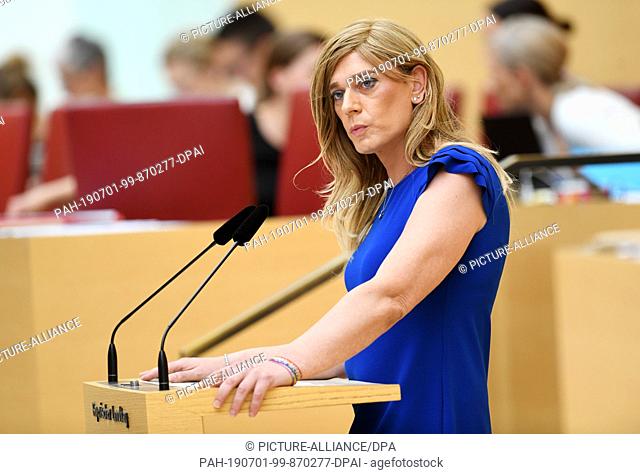 26 June 2019, Bavaria, Munich: Tessa Ganserer (Bündnis 90/Die Grünen) speaks at the plenary session of the Bavarian Parliament in the plenary hall