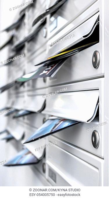 Modern mailboxes filled of leaflets. Business and advertising concepts. Shallow depth of field