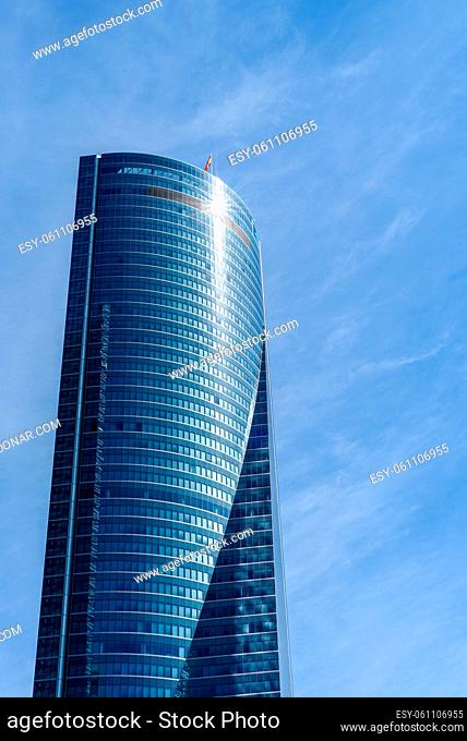 Madrid, Spain - June 14, 2020: Skyscraper against blue sky in Four Towers Business Area. Torre Espacio