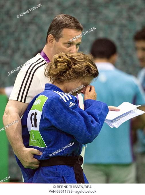 Germanys Mareen Kraeh cries after loosing in the Women's -52kg Judo Women's Semifinal of Table B at the Baku 2015 European Games in Heydar Aliyev Arena in Baku
