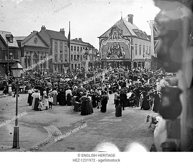 A large crowd gathered in the Market Place, Wallingford, Oxfordshire, during Queen Victoria's jubilee celebrations in 1879