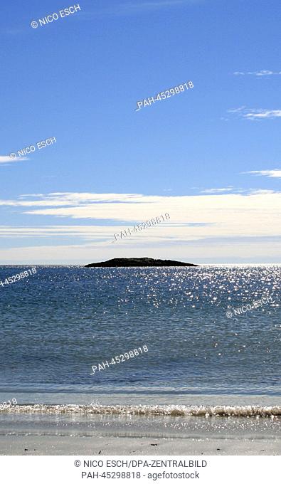 View from the 'Sand Beach' onto a rocky island in the Acadia National Park in Maine, USA, 27 September 2013. The Acadia National Park is known for its rugged...