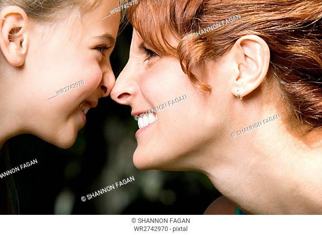 Mother and daughter face to face