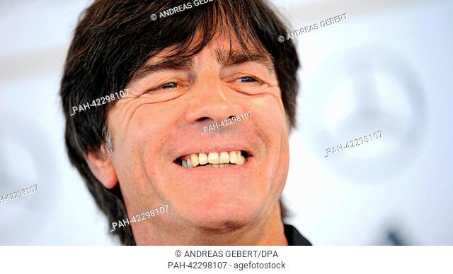 Head coach of the German national soccer team Joachim Loew gestures at a press conference of the German team in Munich, Germany, 04 September 2013