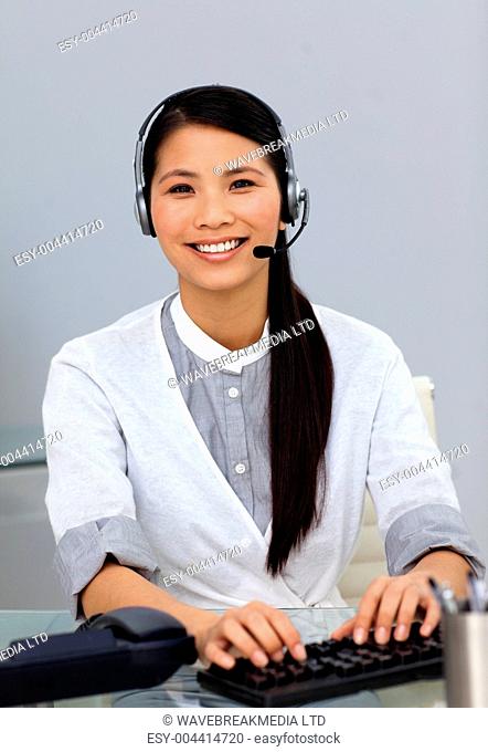 Ethnic customer service representative with headset on