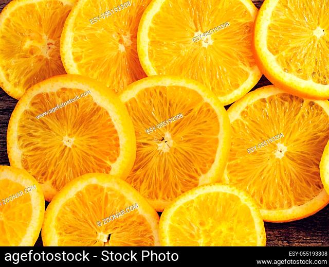 Delicious orange on the wooden table