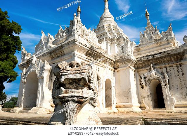 White Pagoda at Inwa city with lions guardian statues. Myanmar (Burma)