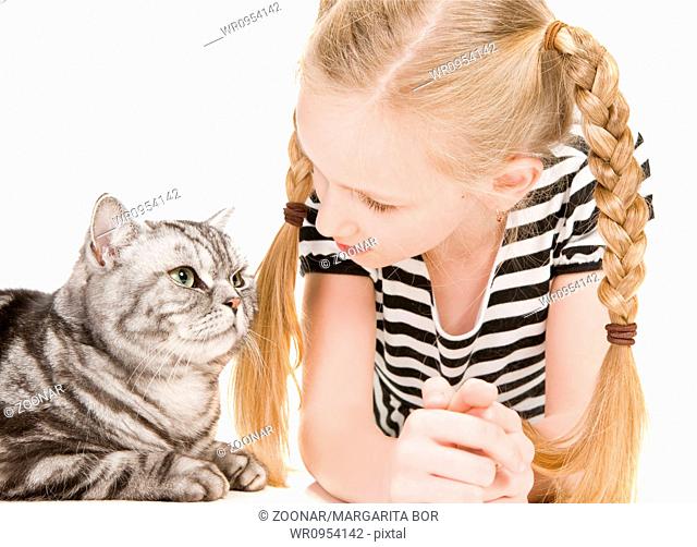 Young girl posing with british shorthair cat