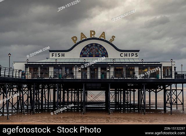Cleethorpes, North East Lincolnshire, England, UK - April 27, 2019: Grey clouds over The Pier