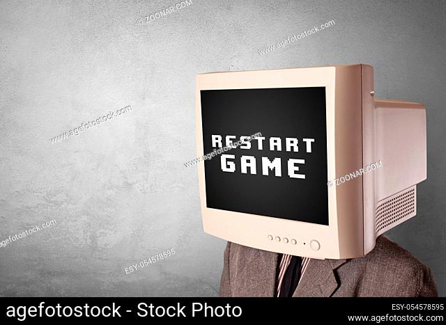Young person with monitor head, gaming concept