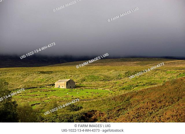 Field barn under a stormy autumn sky in the Trough of Bowland - Lancashire. (Photo by: Wayne Hutchinson/Farm Images/UIG)