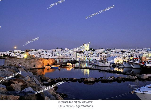 Houses and church at moonrise, Naoussa, island of Paros, the Cyclades, Greece, Europe
