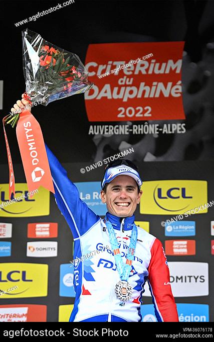 French David Gaudu of Groupama-FDJ celebrates on the podium after winning the third stage of the Criterium du Dauphine cycling race