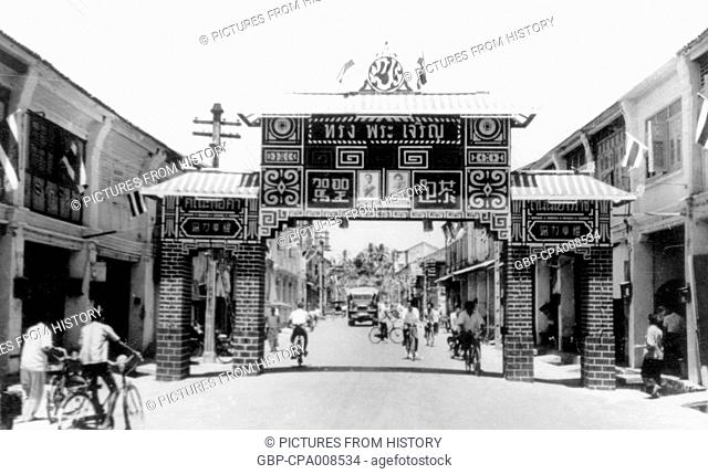 Thailand: A Chinese-style arch welcoming the King and Queen of Thailand to Phuket, 1959