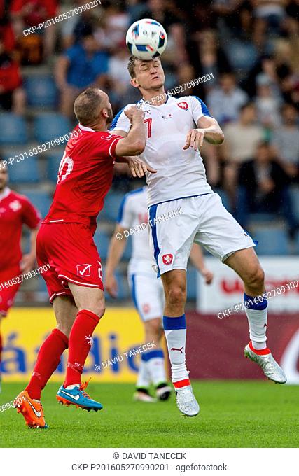Gatt Baldacchino of Malta, left, and Tomas Necid of Czech Republic in action during a friendly soccer match between Czech Republic and Malta in Kufstein