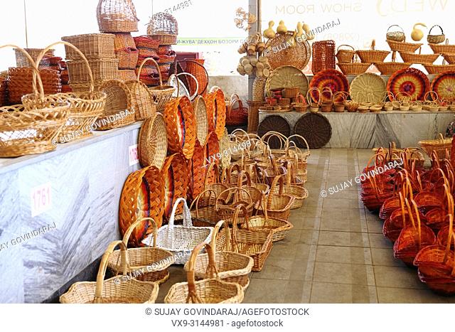 Tashkent, Uzbekistan - May 01, 2017: Handmade cane baskets of various kind at a shop in Chorsu market