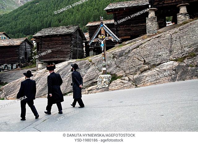 Orthodox Jews walking in Saas Fee, Switzerland