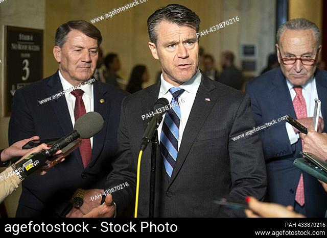 United States Senator Todd Young (Republican of Indiana), center, is joined by United States Senator Mike Rounds (Republican of South Dakota), left