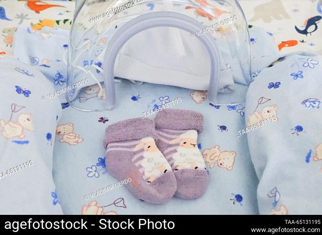 RUSSIA, MOSCOW - NOVEMBER 24, 2023: Baby socks at the opening of a perinatal centre at City Clinical Hospital No 31 in Novatorov Street