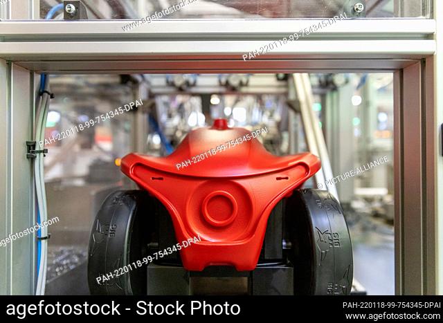 11 January 2022, Bavaria, Burghaslach: A Bobby-Car (Model Neo) is on a production line at the Big toy company (Simba Dickie Group)