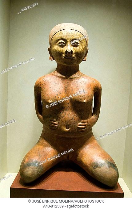 Mexico.Mexico city.National Museum of Antropology. Nayarit culture.Las Cebollas (200BC-600AC).Female figure in ceramic.Representation of a woman giving birth