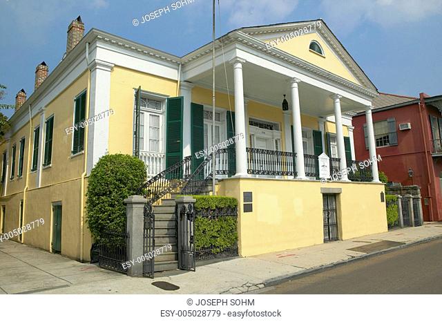 Historic old yellow home in French Quarter of New Orleans, Louisiana