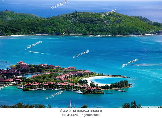 Private villas, marina of Eden Island, in front of the island of Ile au Cerf, Seychelles