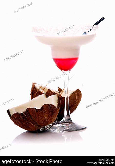 Fresh coconut cocktail over white background