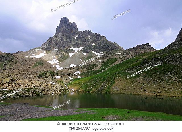 Midi d'Ossau peak and Peyreget lake.Pirineos Mountains.France