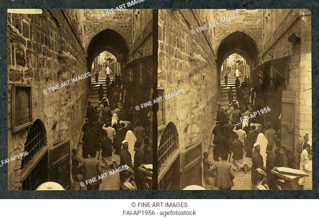 Via Dolorosa, Jerusalem. Pilgrims at station of the Cross (Stereograph). Anonymous . Silver Gelatin Photography. 1913. Private Collection