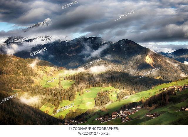 Alpine village in Dolomites mountains