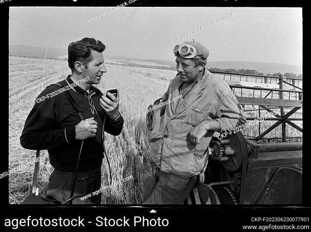 ***AUGUST 6, 1974 FILE PHOTO***Combine harvester operator Vlastimil Ctvrlik (right) and Vaclav Nestipil ""Under Jedova"" Unified Agricltural Cooperative in...