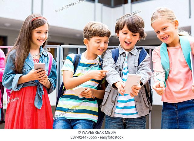 Kids taking selfie with mobile phone