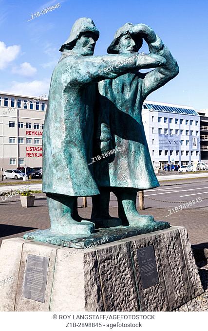 Bronze statue 'Looking Seawards' on the shore of the Old Harbour in Reykjavik