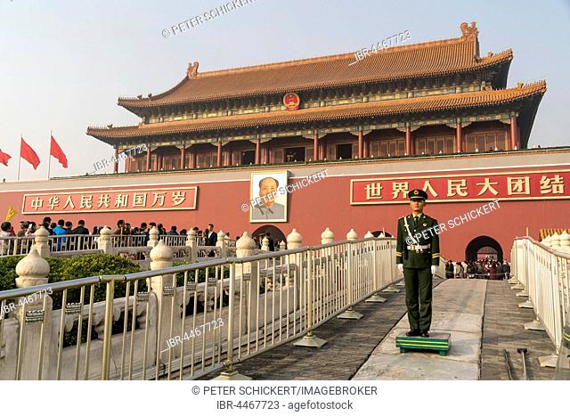 Guardsman in front of portrait of Mao Zedong, Gate of Heavenly Peace, Beijing, China