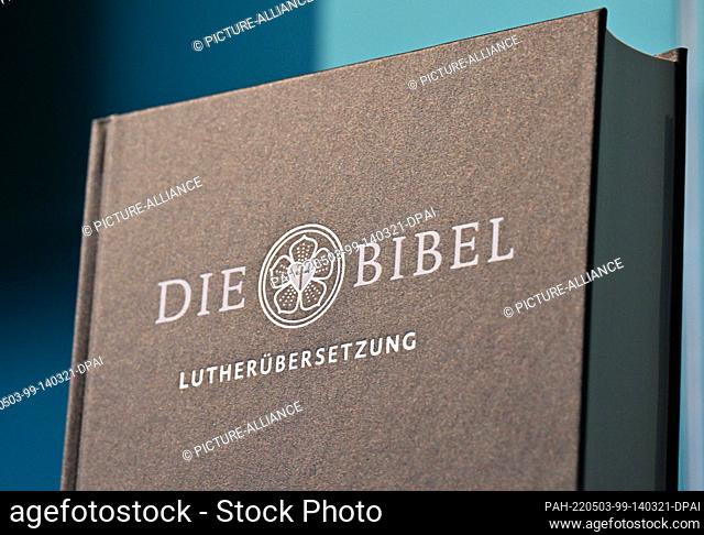 03 May 2022, Thuringia, Eisenach: One of 30 modern editions of the Bible is available for browsing in an exhibition at the Wartburg