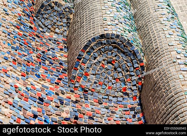 building wall with vintage color mosaic abstract background close up