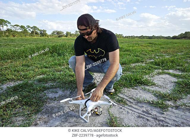 Photographer Kike Calvo learns to fly drones using a DJI Phantom, at a small unmanned aircraft pilot training course at the Unmanned Vehicle University