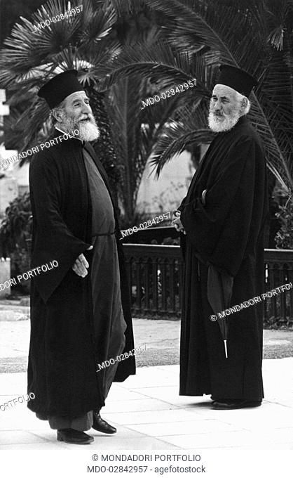 Orthodox priests at the cemetery. Athens, 1970