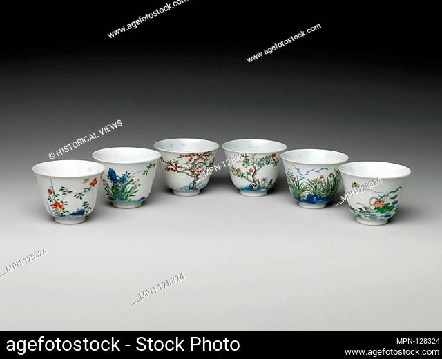 Set of wine cups with flowers of the twelve months. Period: Qing dynasty (1644-1911), Kangxi mark and period (1622-1722); Culture: China; Medium: Porcelain...