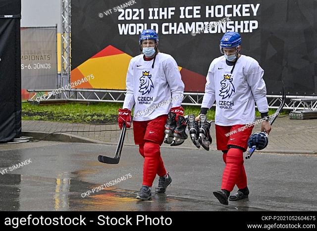 David Musil, left, and Adam Musil of Czech Republic on the way to a bus that will take them to the training hall during the 2021 IIHF Ice Hockey World...