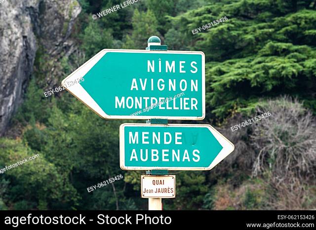 Ales, Occitanie, France, 12 30 2022 -Green direction signs at the banks of the river Gardon, towards Nimes, Avignon and Montpellier
