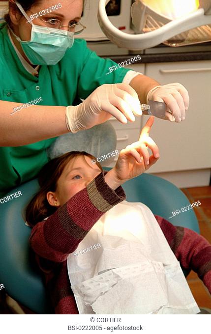 CHILD RECEIVING DENTAL CARE<BR>Photo essay from dental office.<BR>Dental x-ray