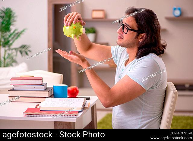 Young student preparing for exams at home
