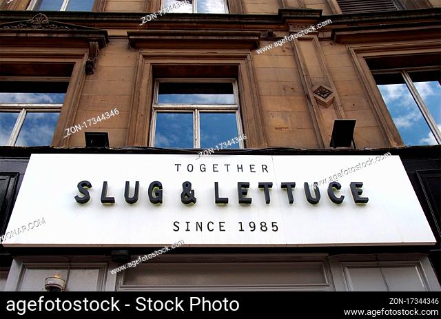 leeds, west yorkshire - 17 June 2021: sign above the slug lettuce pub in boar lane in leeds