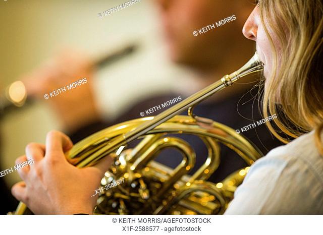 Young musicians: classical music french horn player in rehearsal at Aber Music Fest festival 2015