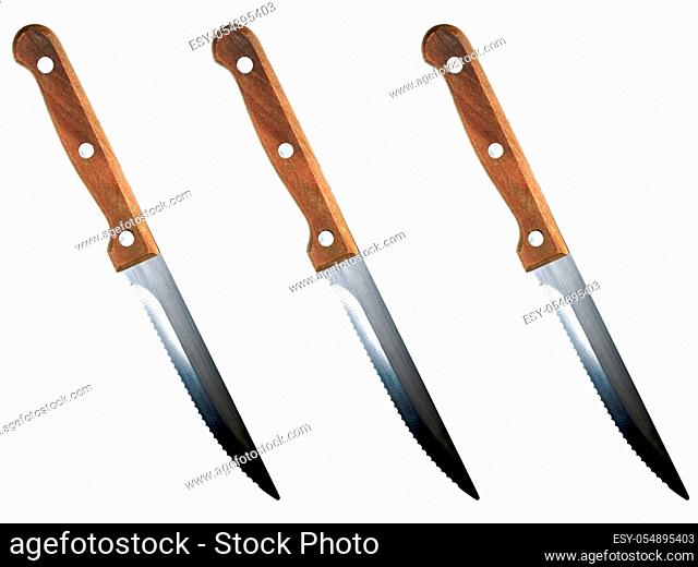 Steak knives isolated against a white background
