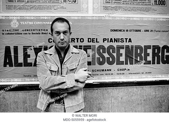 Bulgarian-born French pianist Alexis Weissenberg outside the Teatro Comunale in Modena where he is going to play a concert. Modena, 10th October 1970